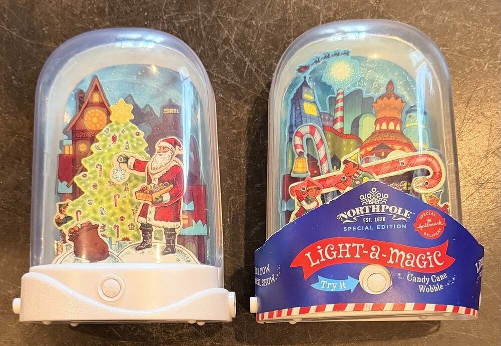 2 Hallmark North Pole Light-a-Magic: Santa Trims The Tree & Candy Cane Wobble